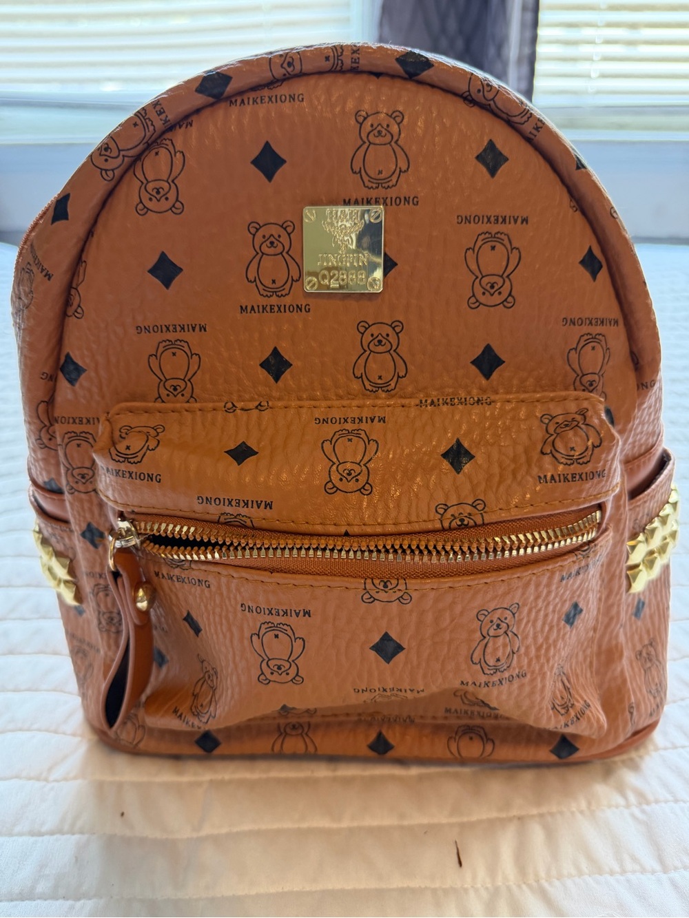 Maikexiong Tan Bear-Print Mini Backpack with Gold Accents